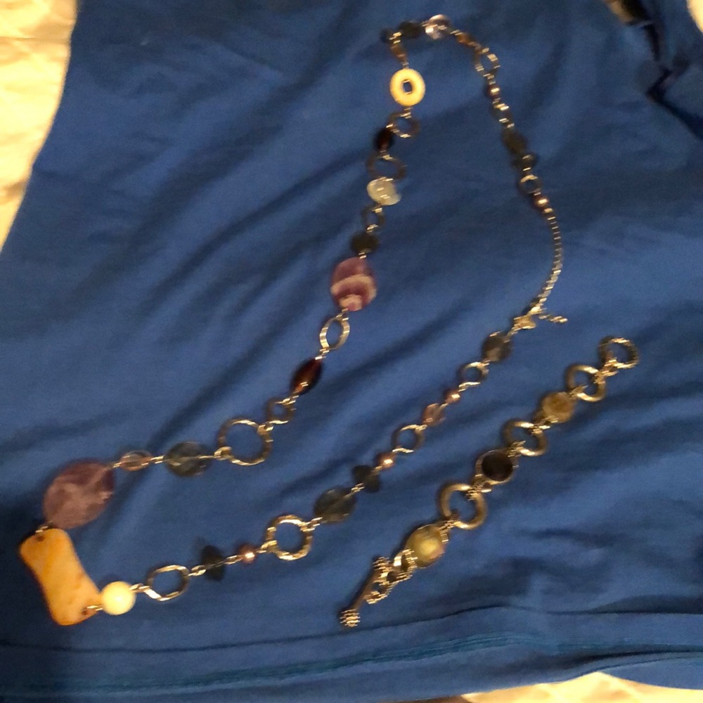 Bracelet , matching purple jeweled stones necklace
